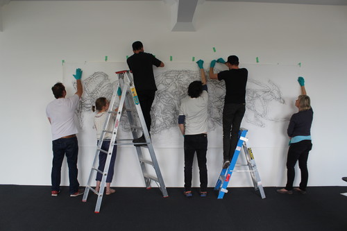 Installing Katie Thomas's drawing on paper, Westenra Terrace (2011).