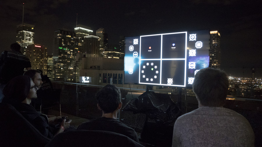 FLOP TOP Arcade, hosted by TAG, with Montreal in the background