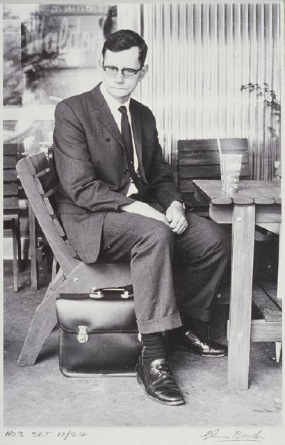 Man at an outdoor cafe