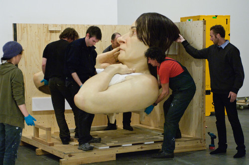 Ron Mueck's In bed being installed at Christchurch Art Gallery. Ron Mueck In bed 2005. Polyester resin, fibreglass, polyurethane, horse hair, cotton, second edition, ed. 1/1. Queensland Art Gallery, Brisbane, purchased, Queensland Art Gallery Foundation 2008. © Ron Mueck courtesy Anthony d'Offay, London