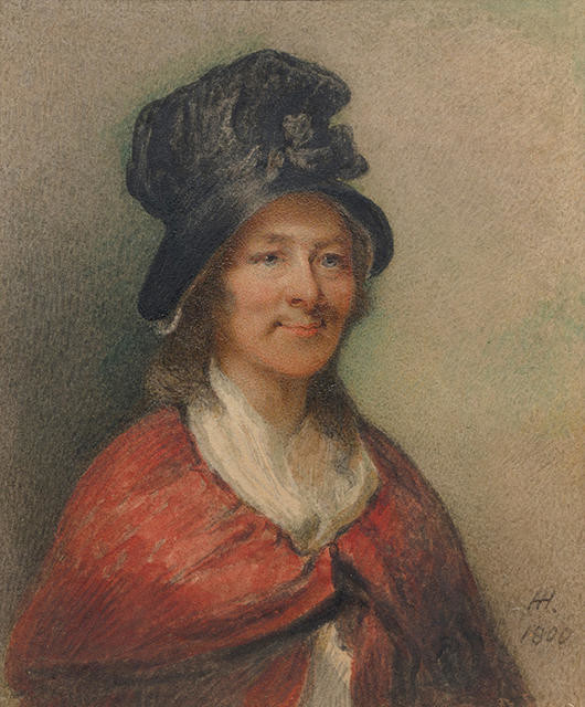 Woman In Red Cape And Black Hat