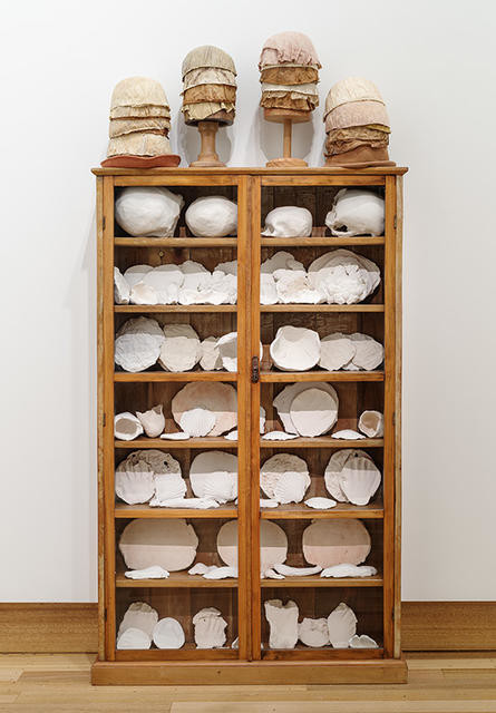 Body parts: White china cupboard