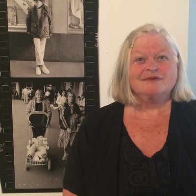 Karen Cunningham in front of David Cook's photograph of her (left) with her friend Lynette.