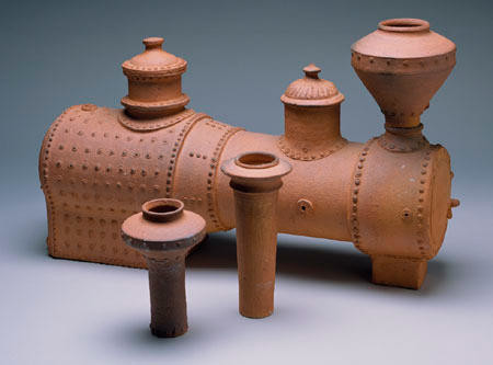 Barry Brickell Loco boiler (with alternative stacks for warming the hands) 1976. Terracotta. Collection of Christchurch Art Gallery Te Puna o Waiwhetū, purchased 1976