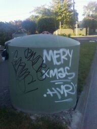 Graffiti on chemical toilet disposal unit, St Albans, Christchurch.