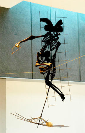 Still Keeping His Balance, He Used The Umbrella As A Safety Net - image of a man with missile