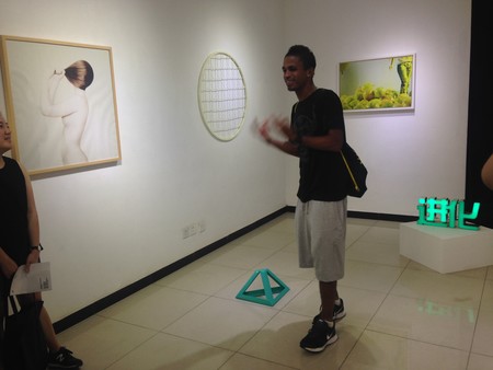 Installation view Intelligentsia Space Beijing, with founder and curator Cruz Garcia Frankowski. Photo: Sophie McKinnon