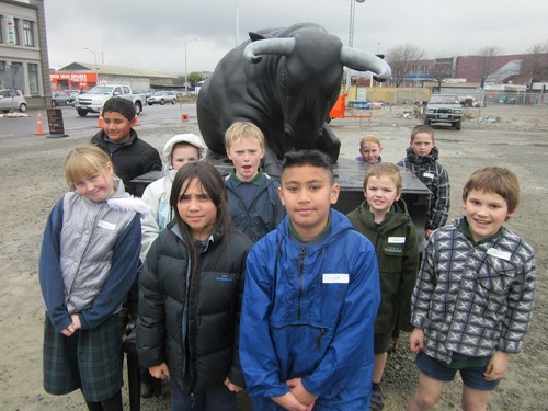 Students from room 3 at St Annes's Catholic School standing beside their favourite sculpture.