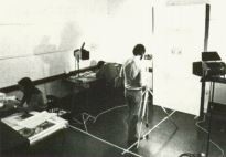 Left to right. Tina Barton, Philip Pigou,and Mark Dunstan at work photographingthe collection and checking the accessionfiles.