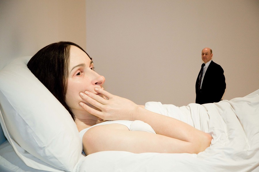 Anthony d’Offay with Ron Mueck’s In bed 2005. Polyester resin, fibreglass, polyurethane, horse hair, cotton, second edition, ed. 1/1. Queensland Art Gallery, Brisbane, purchased, Queensland Art Gallery Foundation 2008. © Ron Mueck courtesy Anthony d’Offay, London